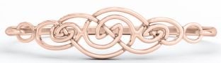 Pulsera con nudo celta irlandés de plata y oro rosa de 14K