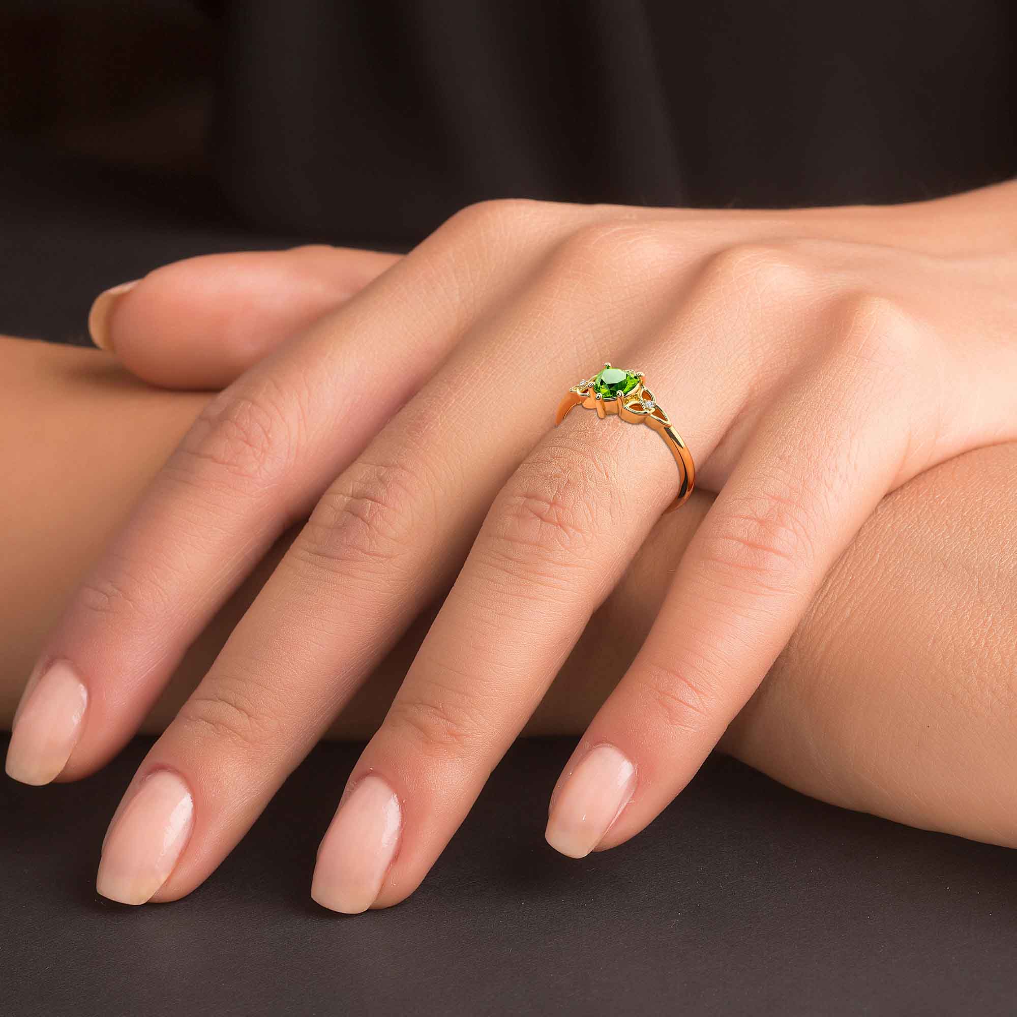 Gold knot top ring meaning